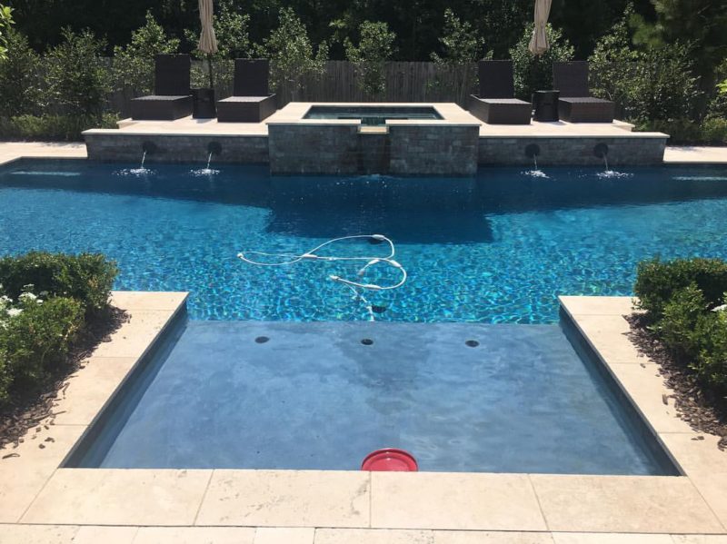 Madisonville pool and raised deck - Crystal Pools and Spas